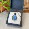 Brown pendant with blue agate stone